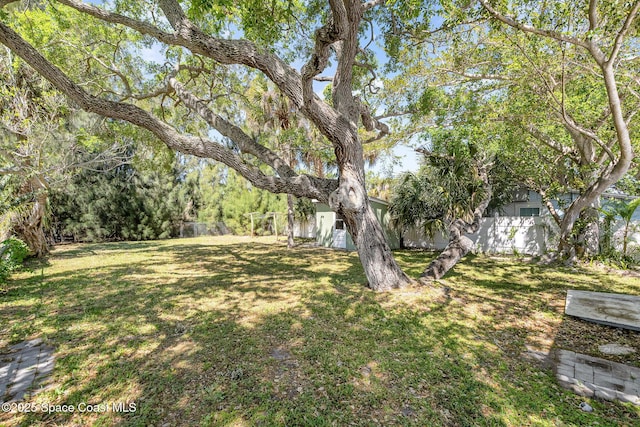 view of yard featuring fence