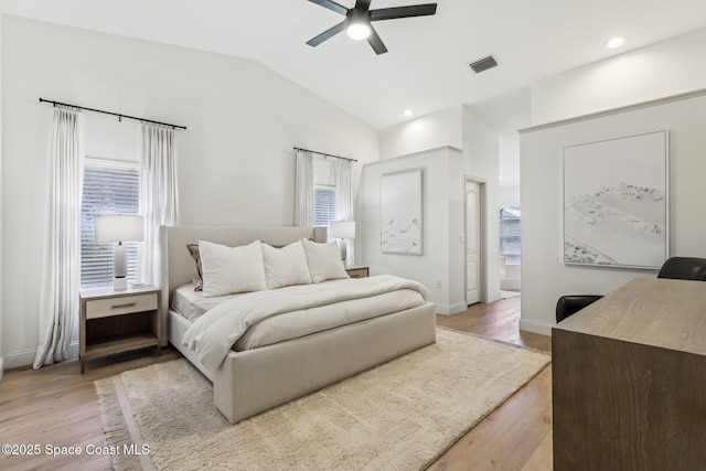 2702 Barrow Dr, Merritt Island, FL 32952 - bedroom with light wood-style flooring, recessed lighting, lofted ceiling, and visible vents
