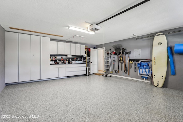 2702 Barrow Dr, Merritt Island, FL 32952 - garage with a garage door opener