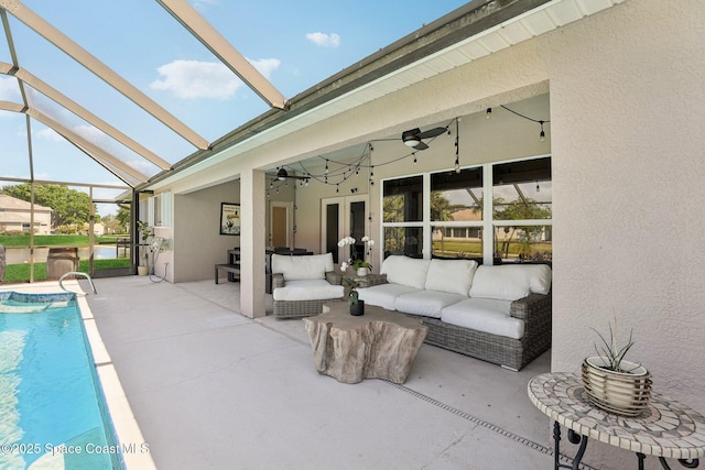 2702 Barrow Dr, Merritt Island, FL 32952 - outdoor pool featuring outdoor lounge area, a patio, a ceiling fan, and a lanai