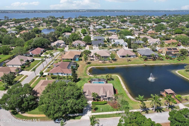 2702 Barrow Dr, Merritt Island, FL 32952 - bird's eye view with a residential view and a water view