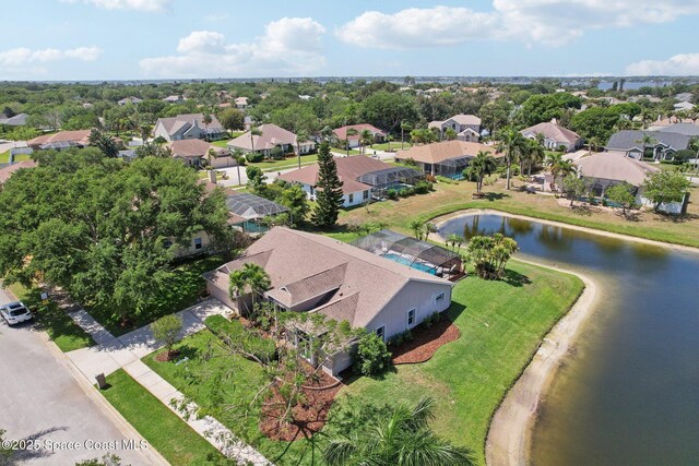 2702 Barrow Dr, Merritt Island, FL 32952 - drone / aerial view featuring a residential view and a water view