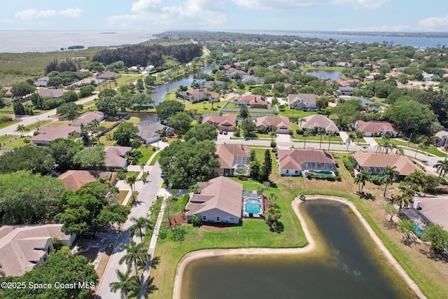 2702 Barrow Dr, Merritt Island, FL 32952 - drone / aerial view with a water view and a residential view