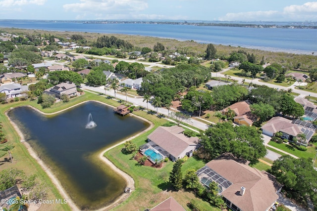2702 Barrow Dr, Merritt Island, FL 32952 - drone / aerial view with a residential view and a water view