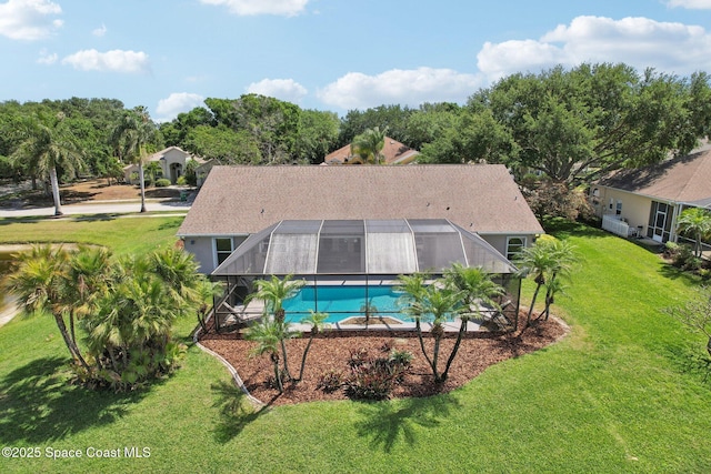 2702 Barrow Dr, Merritt Island, FL 32952 - outdoor pool featuring a yard and a lanai