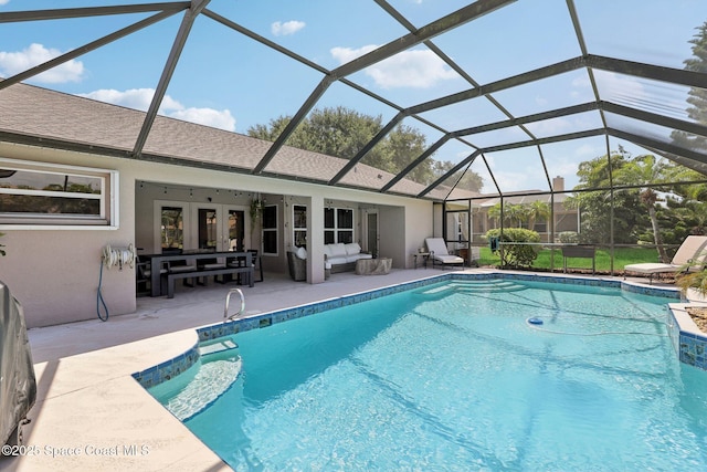 2702 Barrow Dr, Merritt Island, FL 32952 - pool featuring an outdoor living space, french doors, a lanai, and a patio area