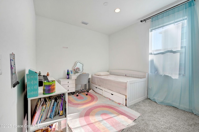 carpeted bedroom featuring recessed lighting and visible vents