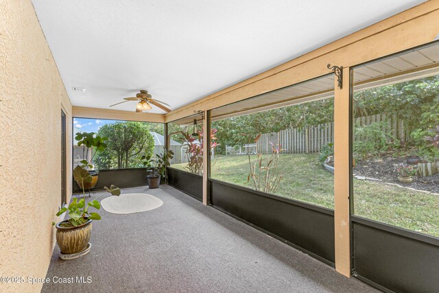 523 Hidden Hollow Dr, Merritt Island, FL 32952 - unfurnished sunroom featuring visible vents and a ceiling fan