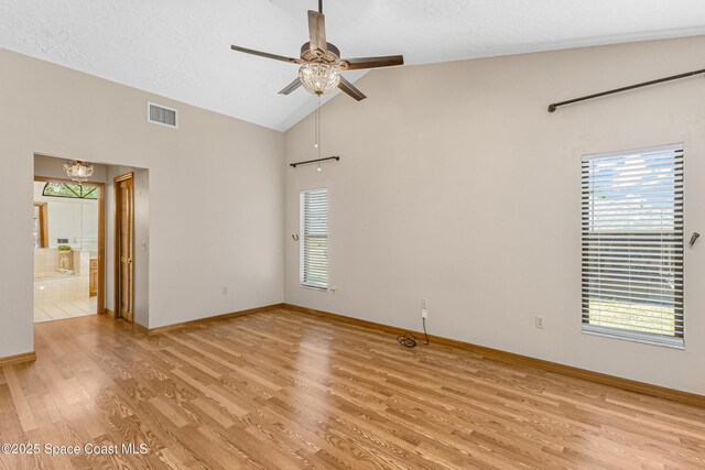 523 Hidden Hollow Dr, Merritt Island, FL 32952 - unfurnished room with a ceiling fan, a textured ceiling, light wood-style flooring, baseboards, and visible vents