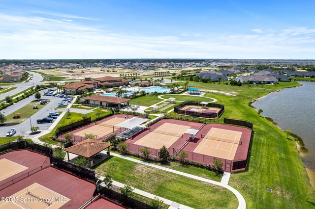 7785 Millbrook Ave, Melbourne, FL 32940 - aerial perspective of suburban area with a large body of water