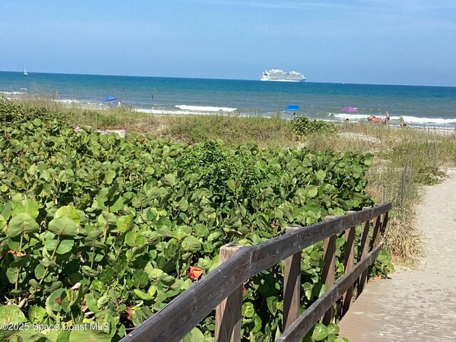 view of water feature with a beach view