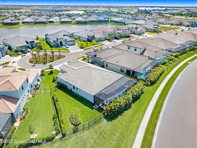 birds eye view of property with a residential view