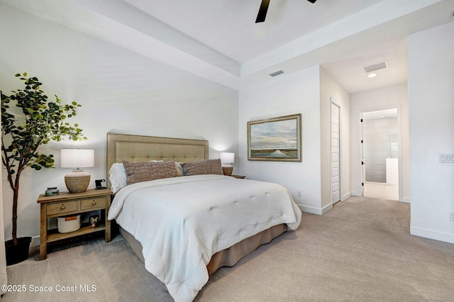 bedroom with a ceiling fan, baseboards, light colored carpet, and visible vents