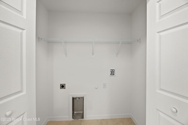 laundry area featuring baseboards, gas dryer hookup, hookup for a washing machine, and electric dryer hookup