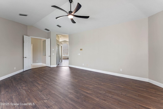 706 Palmer Way, Melbourne, FL 32940 - unfurnished bedroom with lofted ceiling, dark wood-style flooring, baseboards, and ceiling fan