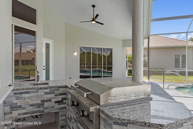 706 Palmer Way, Melbourne, FL 32940 - view of patio / terrace featuring exterior kitchen, area for grilling, a sink, an outdoor pool, and glass enclosure