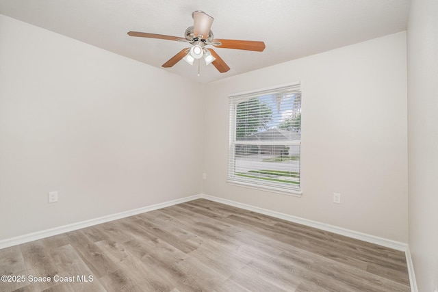 2728 Maderia Cir, Melbourne, FL 32935 - empty room with baseboards, light wood finished floors, and ceiling fan