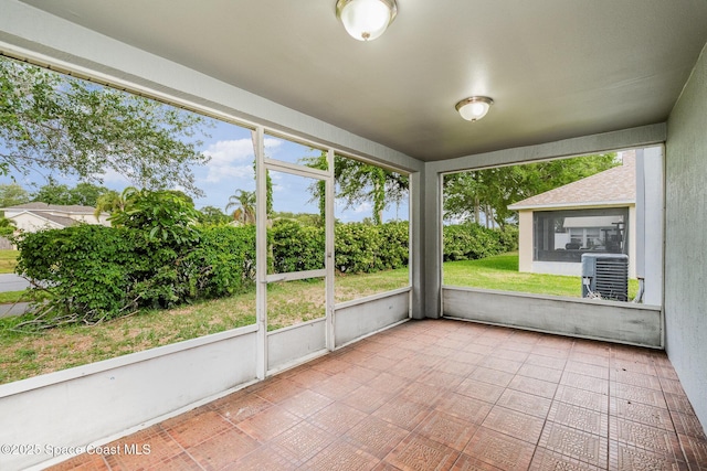 2728 Maderia Cir, Melbourne, FL 32935 - unfurnished sunroom featuring a healthy amount of sunlight