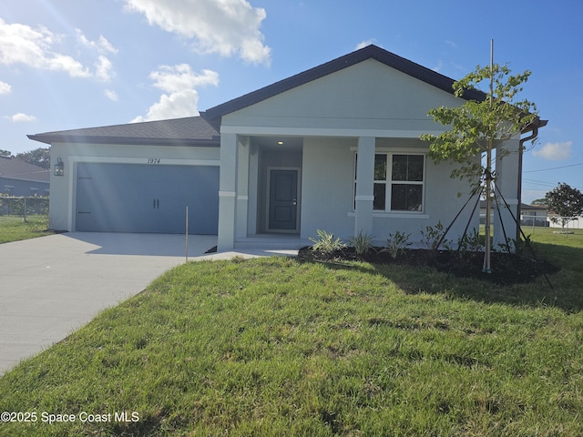single story home featuring concrete driveway, stucco siding, an attached garage, a front lawn, and a shingled roof
