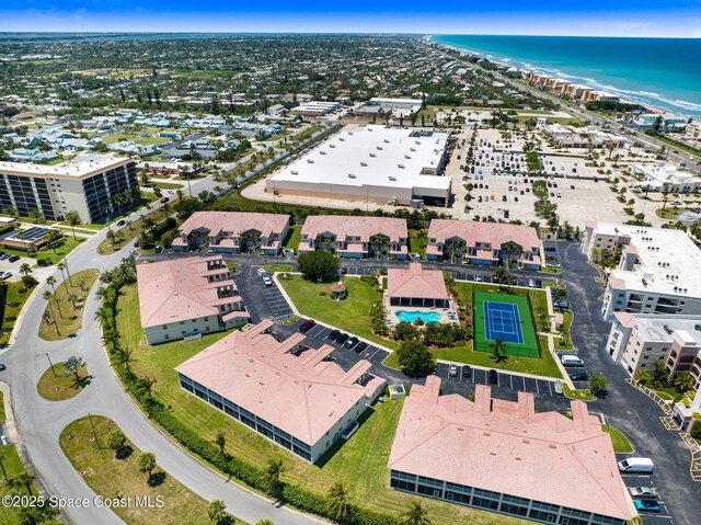 129 Lancha Cir Unit 201, Indian Harbour Beach, FL 32937 - aerial view featuring a water view and a view of the beach