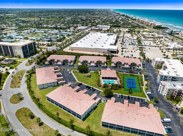 129 Lancha Cir Unit 201, Indian Harbour Beach, FL 32937 - bird's eye view with a water view and a beach view