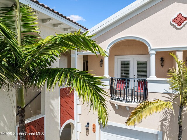 129 Lancha Cir Unit 201, Indian Harbour Beach, FL 32937 - property entrance featuring stucco siding