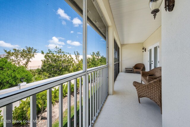 129 Lancha Cir Unit 201, Indian Harbour Beach, FL 32937 - balcony featuring french doors