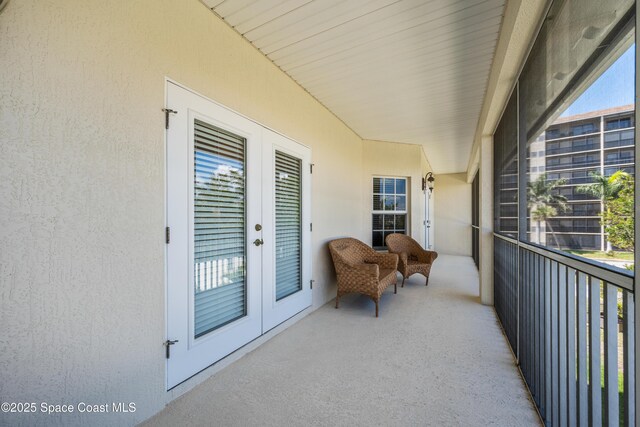 129 Lancha Cir Unit 201, Indian Harbour Beach, FL 32937 - balcony featuring french doors