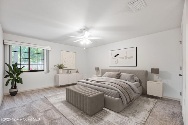 787 Greenwood Manor Cir Unit 14, West Melbourne, FL 32904 - bedroom with visible vents, light colored carpet, and ceiling fan
