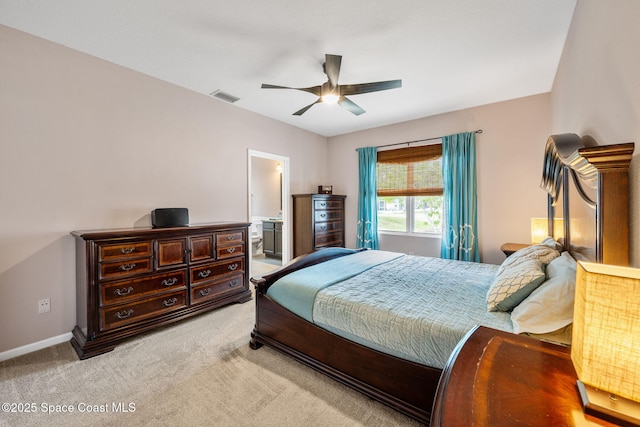 3666 Mount Carmel Ln, Melbourne, FL 32901 - bedroom with light colored carpet, baseboards, ceiling fan, and ensuite bath