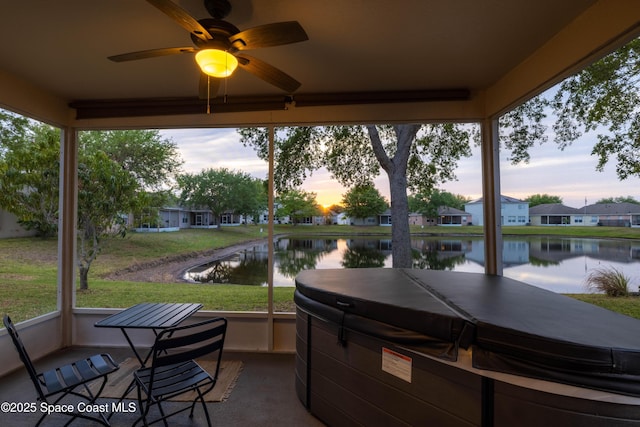 3666 Mount Carmel Ln, Melbourne, FL 32901 - view of patio featuring a hot tub, a water view, and ceiling fan