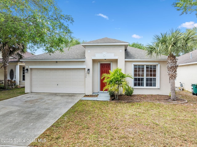 3666 Mount Carmel Ln, Melbourne, FL 32901 - view of front of house with a garage, stucco siding, a shingled roof, and concrete driveway