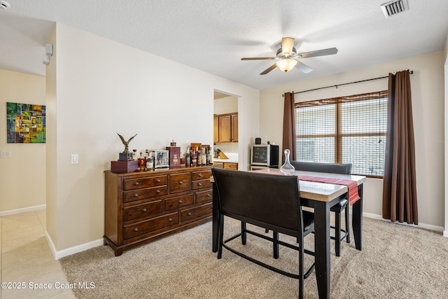 3666 Mount Carmel Ln, Melbourne, FL 32901 - dining space featuring a ceiling fan, baseboards, and light carpet