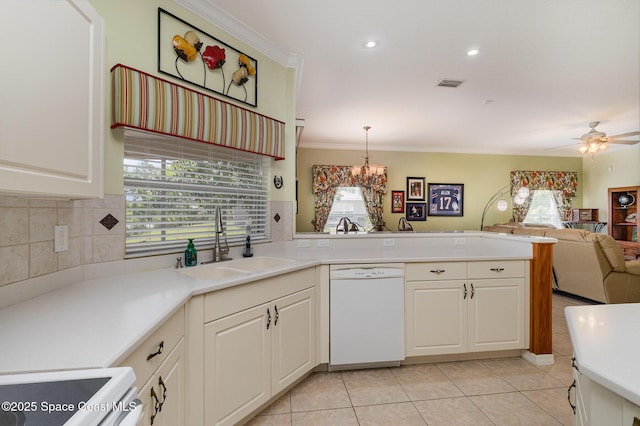 2298 Mantilla Ave SE, Palm Bay, FL 32909 - kitchen with a sink, dishwasher, a peninsula, stove, and visible vents