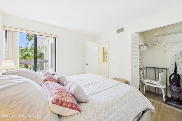 6365 Bahia Del Mar Blvd S Unit 210, Saint Petersburg, FL 33710 - bedroom featuring visible vents, a closet, and wood finished floors