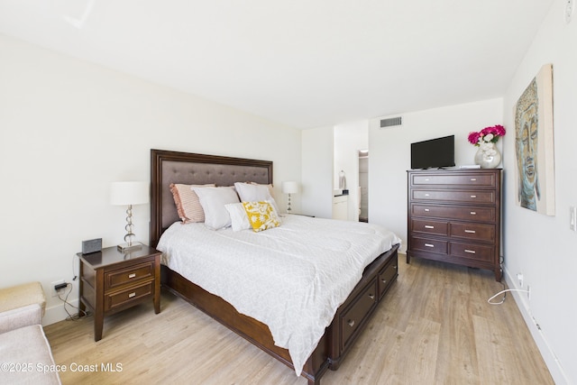 6365 Bahia Del Mar Blvd S Unit 210, Saint Petersburg, FL 33710 - bedroom with light wood finished floors, baseboards, and visible vents