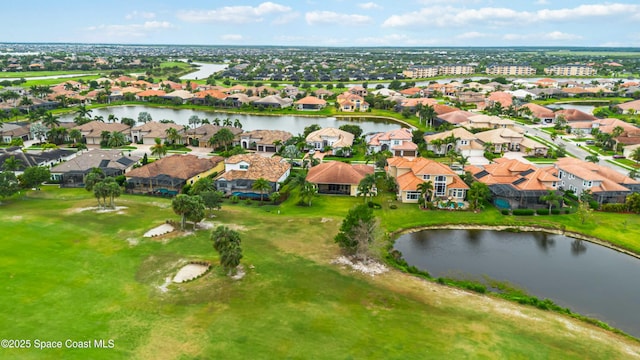 aerial view with a water view and a residential view