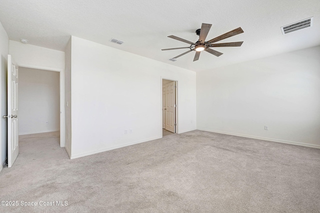 1217 Casey Ave, Rockledge, FL 32955 - unfurnished room featuring a ceiling fan and light carpet