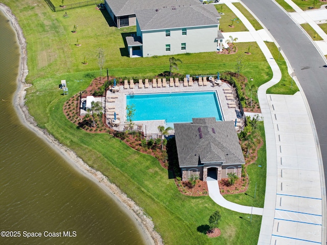 1217 Casey Ave, Rockledge, FL 32955 - view of subject property featuring a pool and a nearby body of water