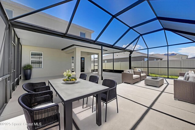 1217 Casey Ave, Rockledge, FL 32955 - view of patio / terrace with outdoor lounge area, outdoor dining space, and glass enclosure
