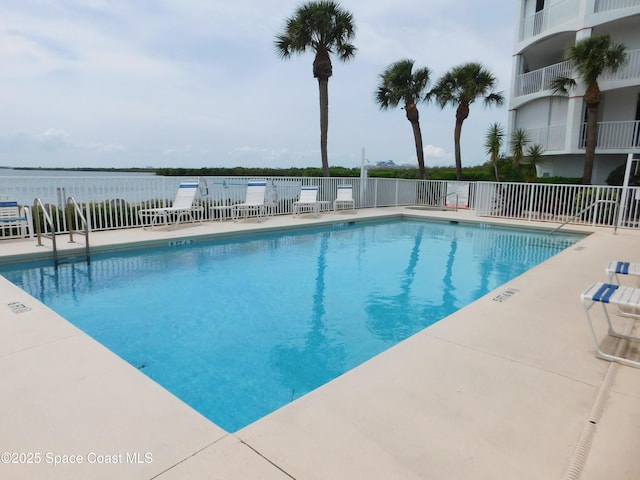 8903 Laguna Ln Unit 403, Cape Canaveral, FL 32920 - community pool featuring fence