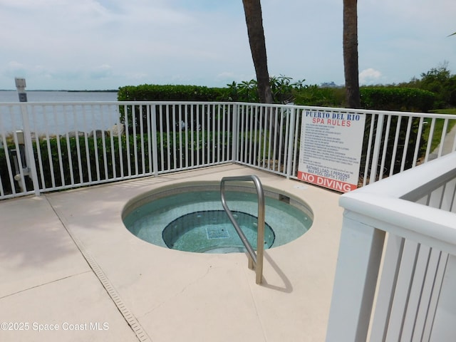8903 Laguna Ln Unit 403, Cape Canaveral, FL 32920 - view of swimming pool featuring a community hot tub