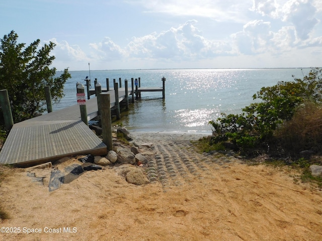 8903 Laguna Ln Unit 403, Cape Canaveral, FL 32920 - dock featuring a water view