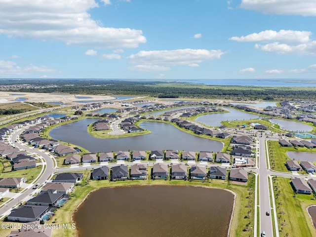2257 Kamin Dr, Melbourne, FL 32940 - birds eye view of property with a water view and a residential view