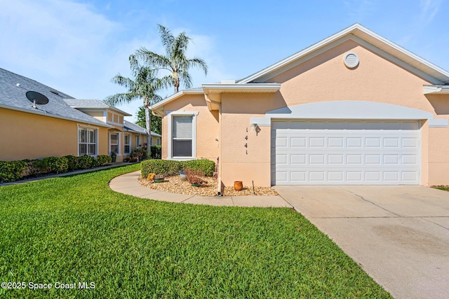 1441 Royal Fern Dr, Melbourne, FL 32940 - view of front of home with stucco siding, driveway, a front lawn, and an attached garage
