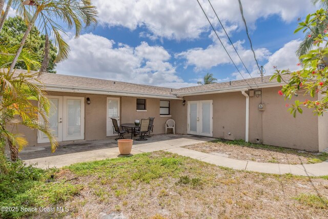2180 Lakeview Dr, Melbourne, FL 32935 - rear view of property with a patio, french doors, and stucco siding
