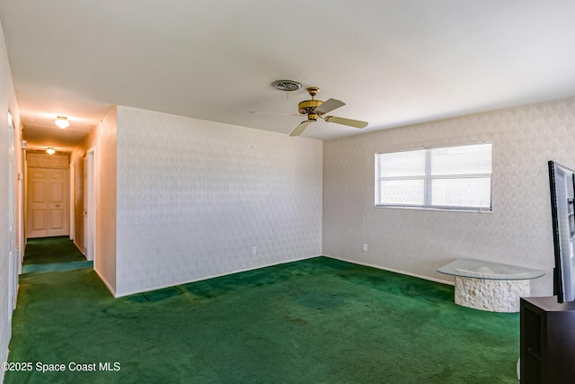 2180 Lakeview Dr, Melbourne, FL 32935 - carpeted empty room with a ceiling fan