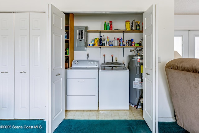 2180 Lakeview Dr, Melbourne, FL 32935 - washroom featuring washing machine and dryer, electric panel, water heater, light tile patterned flooring, and laundry area