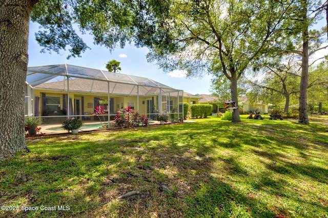 1772 Windbrook Dr SE, Palm Bay, FL 32909 - view of yard featuring a lanai and an outdoor pool