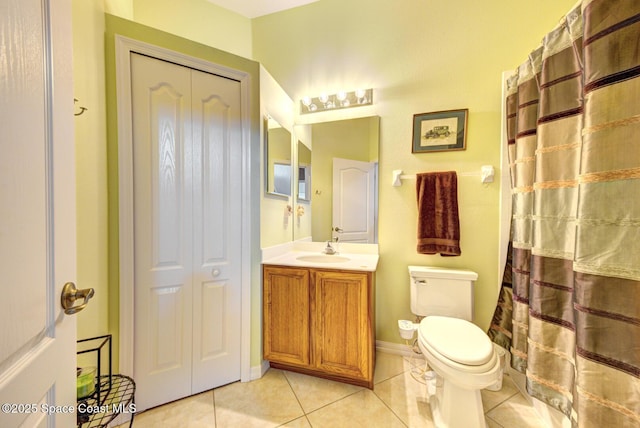 1772 Windbrook Dr SE, Palm Bay, FL 32909 - bathroom featuring vanity, toilet, tile patterned flooring, and curtained shower